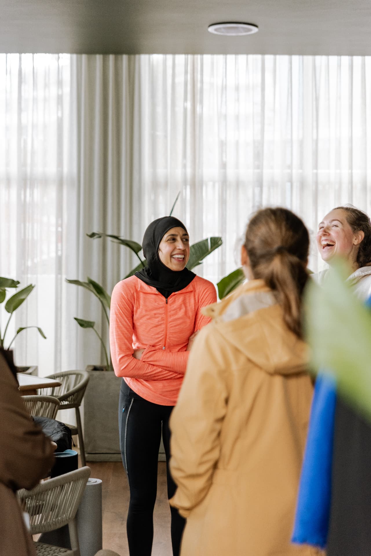 Women laughing together at a Full Circle morning